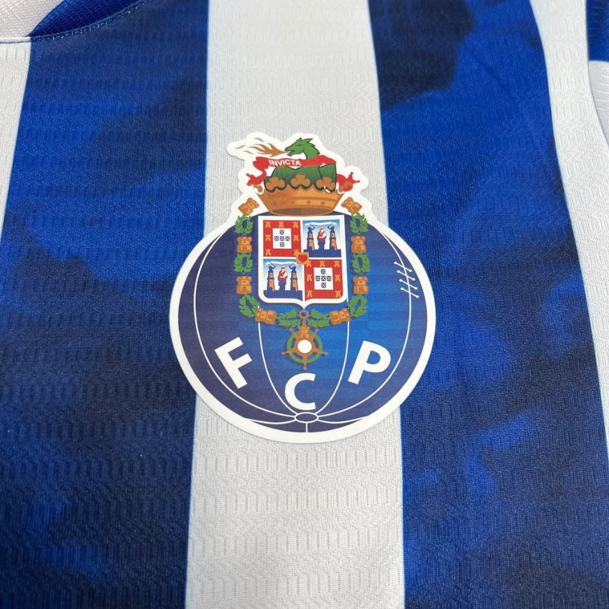 Camisola primeiro equipamento azul/branco 24/25